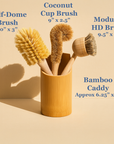 Set of eco-friendly cleaning brushes in a bamboo caddy with dimensions labeled on a beige background